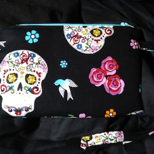 Wristlet Purse with swivel clasp strap.