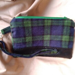 Wristlet Purse with swivel clasp strap.