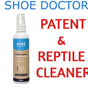 May include: A blue and white bottle of Shoe Doctor Patent & Reptile Leather Cleaner. The bottle is labelled with the product name and instructions for use. The bottle is 175ml.