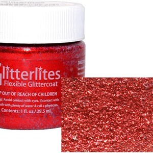 May include: A small jar of red glitter glue labeled "Glitterlites Flexible Glittercoat". The jar has a white lid and a warning label that reads "Keep out of reach of children".