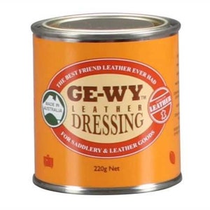 May include: A round orange can with a white label that says "GE-WY Leather Dressing" and "The Best Friend Leather Ever Had". The can is 220g net and is made in Australia.