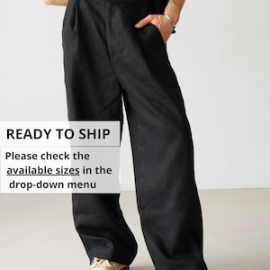 May include: Black wide-leg pants with pleats and a relaxed fit. The pants are made of a linen blend and have a casual, comfortable style. READY TO SHIP. Please check the available sizes in the drop-down menu.