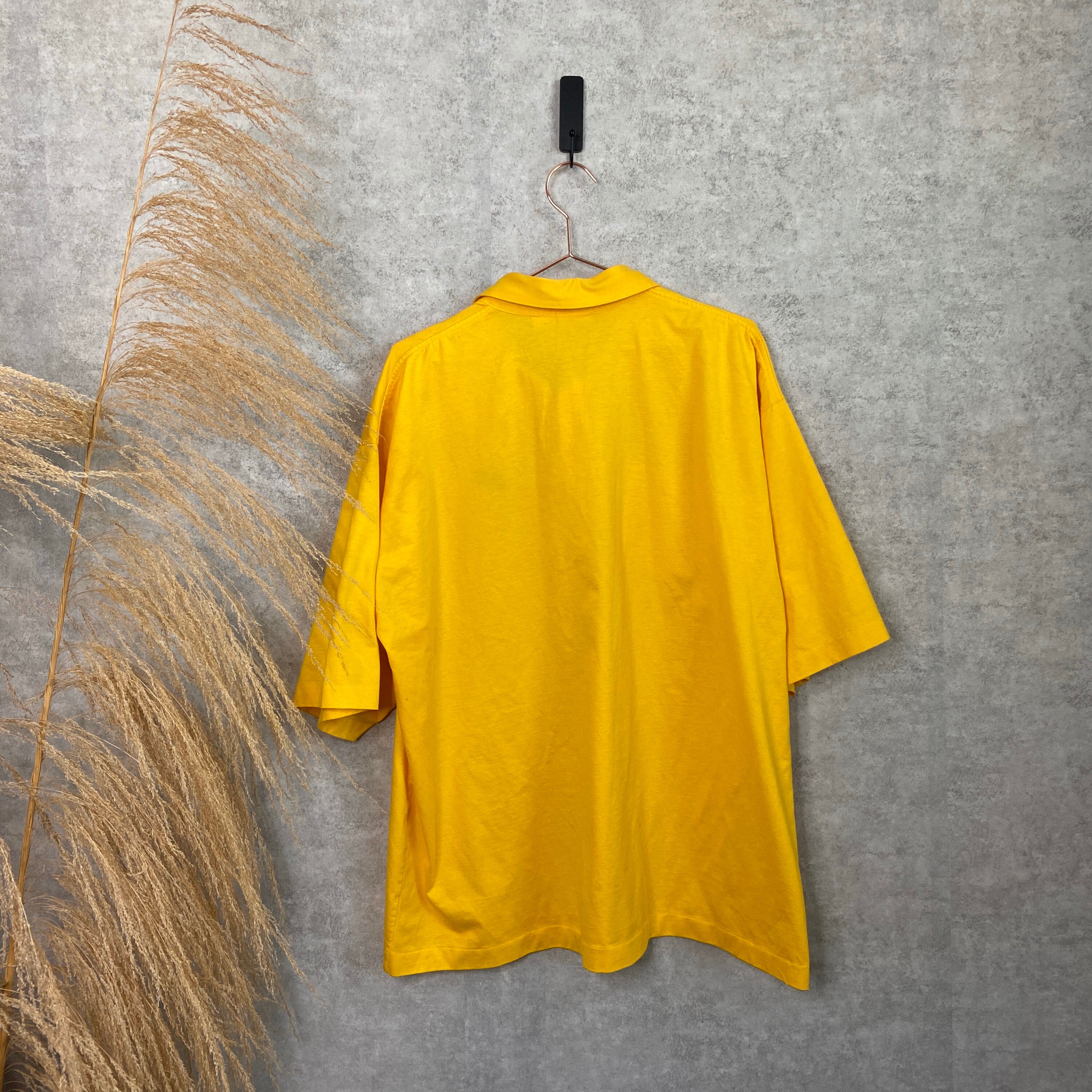 Vintage 1980’s Nike Yellow Oversized Pocket Polo Shirt