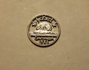 Canadian1986 5 cent cut coin pendant