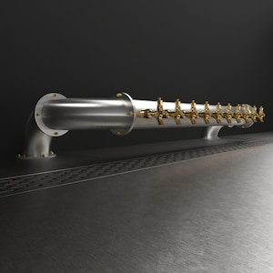 May include: A silver metal beer tap with 16 gold spouts, mounted on a stainless steel bar top.