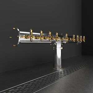 May include: A stainless steel beer tap system with multiple gold spouts. The tap system is mounted on a black wall and has a metal base.