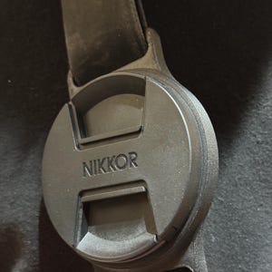 Objektivlockshållare för 67, 72, 77 och 82 mm-lock, passar för 45 mm rem