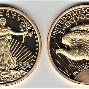 May include: A gold-colored coin with a depiction of Liberty on one side and an eagle in flight on the other. The coin reads "LIBERTY" and "UNITED STATES OF AMERICA TWENTY-DOLLARS IN GOD WE TRUST".