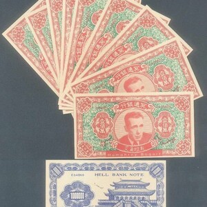 May include: A stack of ten vintage novelty 'Hell Bank Notes' with a portrait of Humphrey Bogart. The notes are printed in red, green, and black with Chinese characters and the text 'Hell Bank Note' and 'E64965'.