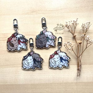 Two Lops Bow Bunny Rabbit アクリルキーチェーンチャーム、グリッターエポキシコーティング付き | 説明をお読みください。