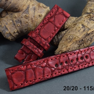 Op de afbeelding: Rood alligator horlogeband met een maat van 20/20 - 115/75 mm.