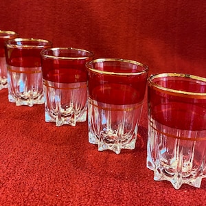 French shot glasses. Set of 5. Red stripe with gold rim and band. Made in France. 1960's