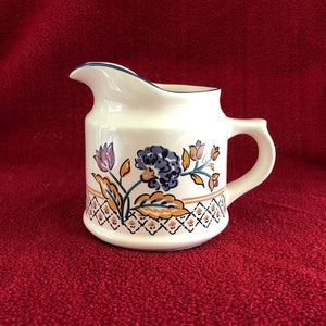 Camargue The Boots Company floral pattern ceramic milk jug. Made for The Boots Company 9cm tall 9cm at base. 1980&#39;s