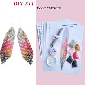 May include: A DIY kit for bead earrings featuring a pair of finished long fringe earrings with a moon and landscape design in pink, yellow, grey, and white. The kit includes printed pattern sheets, small bags of coloured beads, and earring hooks.