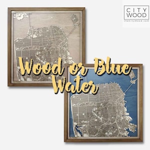 May include: Two framed wood maps of San Francisco, one with a natural wood finish and the other with blue water. The text "Wood or Blue Water" is superimposed over the images.