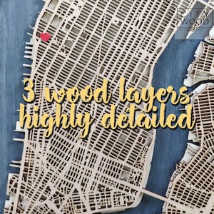 May include: A detailed wooden map of a city with three layers of wood. The map is on a blue background and has a red heart marking a location. The text "3 wood layers highly detailed" is visible in the image.