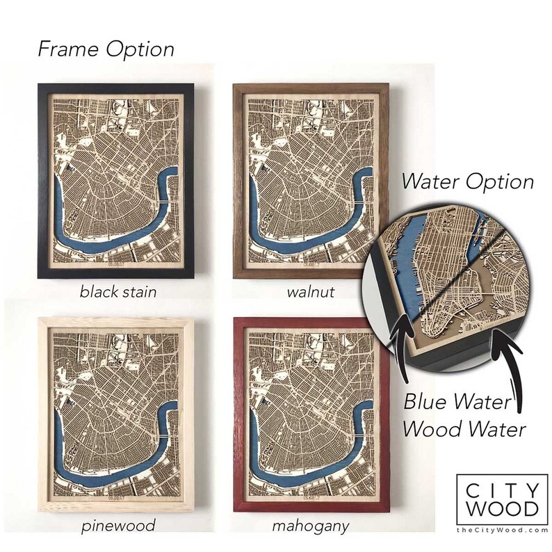 May include: Four framed wood maps with different frame colors: black stain, walnut, pinewood, and mahogany. The maps show a city with a river and are available with blue water or wood water.