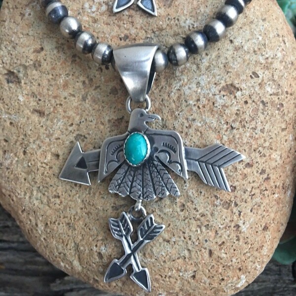 Russell Sam Sterling Silver Turquoise Thunderbird Pendant