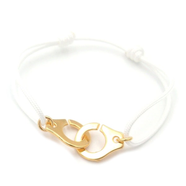 Bracelet menotte doré et cordon Blanc