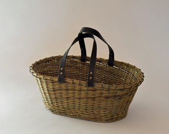 Low green wicker shopping basket