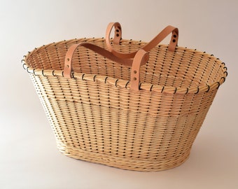 Large white wicker shopping basket
