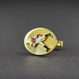 This is a unique vintage piece of mens jewelry that will show his impeccable attention to detail.