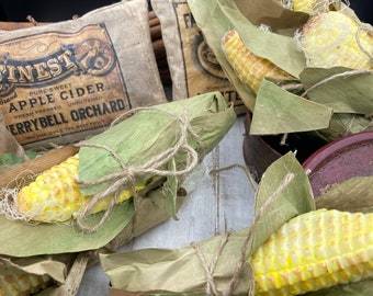 Faux corn on the cob in husk