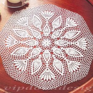 May include: White crocheted doily with a delicate floral pattern. The doily is circular and has a diameter of approximately 12 inches.