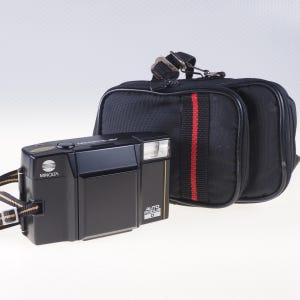 Minolta AF-S Quartz Auto Focus D, 35mm point and shoot camera, tested with film