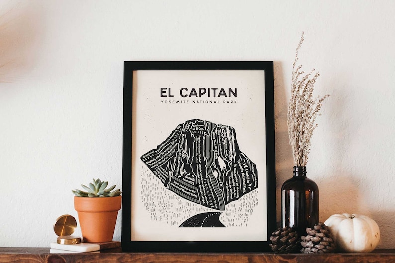 May include: Black and white illustration of El Capitan in Yosemite National Park, printed on a white background and framed in a black frame.
