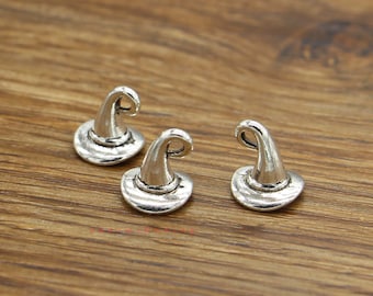 May include: Three silver-toned witch hat charms with a loop at the top for attaching to jewelry or other crafts.