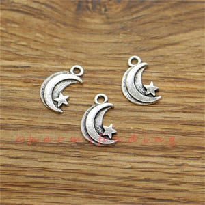 50 stuks maan- en sterbedels Celestial Charms antiek zilverkleur 11 x 17 mm cf3476