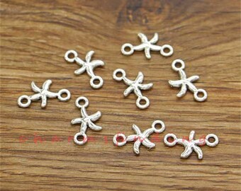 May include: Silver tone starfish charms with jump rings. These charms are perfect for jewelry making, scrapbooking, and other craft projects.