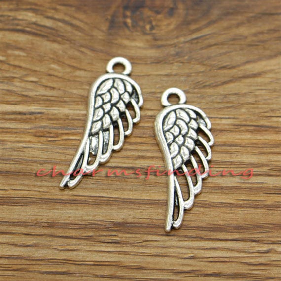 Angel Wing Charm Antiqued Sterling Silver Angel Wing Charm Antiqued Sterling Silver
