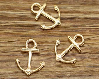 May include: Three gold-colored metal anchor charms. The anchors are all the same design, but vary in size. The charms are perfect for adding a nautical touch to jewelry or crafts.
