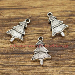50 breloques pour sapin de Noël breloques pour les fêtes breloques à feuilles persistantes ton argent antique 14 x 22 mm CF1299