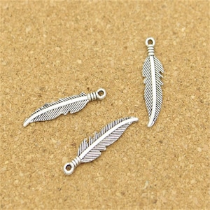 50pcs Feather Charms Bird Charms Antique Silver Tone 27x7mm cf0584