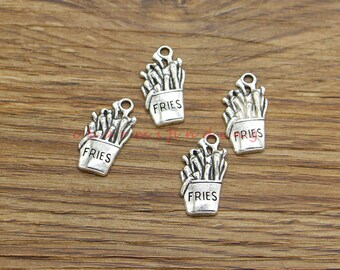 May include: Four silver-toned metal charms shaped like french fries in a paper container. Each charm has the word "FRIES" printed on the container.