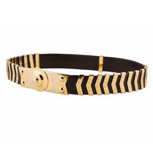 May include: A gold and black belt with a central gold plate and chevron-shaped gold accents. The belt has a black leather backing and a gold buckle. This fashion accessory is suitable for various outfits.