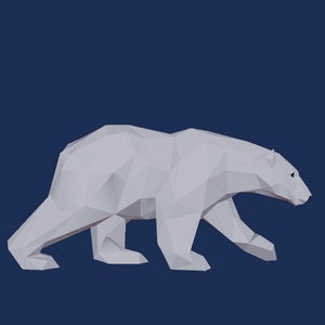 Puede incluir: Un oso polar de origami blanco caminando sobre un fondo azul oscuro.