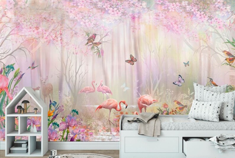 May include: A pink and white watercolor mural depicting a whimsical forest scene with pink flamingos, butterflies, and birds. The mural is displayed in a room with a white couch and a white bookshelf.