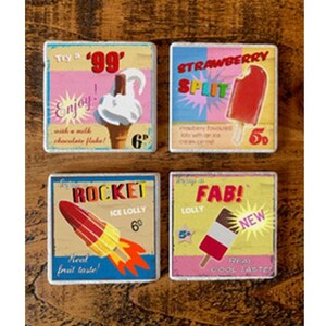 May include: Four vintage-style square signs depicting ice lollies and ice cream. The signs advertise a '99' cone, a Strawberry Split, a Rocket ice lolly, and a Fab! lolly. Each sign has a unique color scheme and text, with prices in pence.