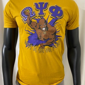 Omega Psi Phi Que in Me  T Shirt OLD GOLD