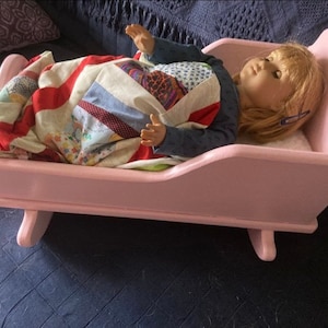 Doll cradle for 18 inch dolls.