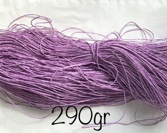 May include: A large bundle of lavender-colored paper cord, weighing 290 grams.