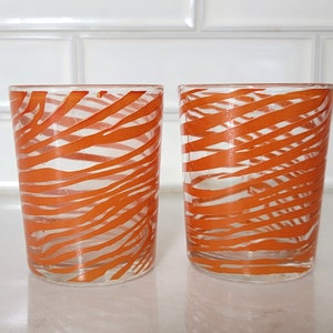 Pair of Vintage Orange Swirl Juice Glasses