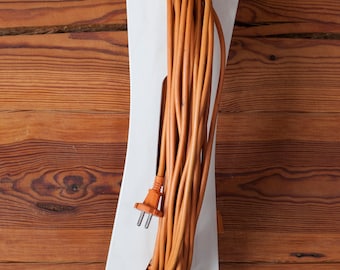 Extension Cord Holder. Unique design. Portable. With handle. Plywood. Stylish. White.