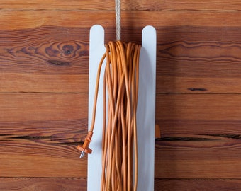 Extension Cord Holder. Unique design. Portable. Hanging. Plywood. Stylish. White.