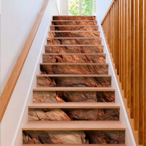 Dark red orange brown rock texture with cracks Stair Panel Rough mountain surface Stone granite background stair risers Brown rock staircase
