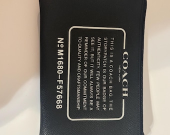 Torebka Coach Storypatch – czarna skórzana saszetka (nr modelu M1680-F57668)